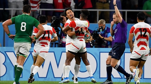 Japan celebrate their winning score