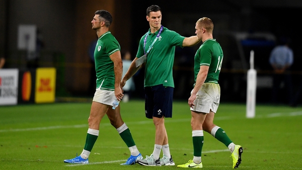 Johnny Sexton consoles his vanquished team-mates after the upset in Shizuoka
