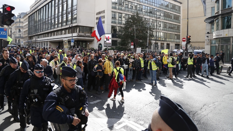 Anti riot police face protesters during an anti-government "yellow vests" demonstration in Paris
