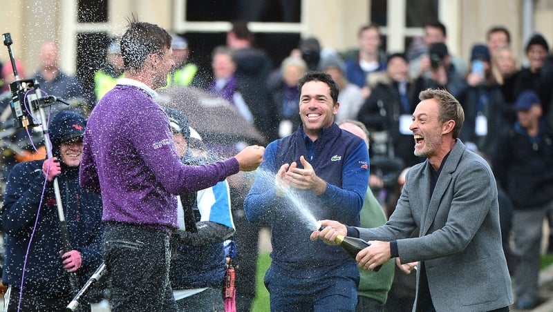 Perez celebrates with Raphael Jacquelin on the 18th