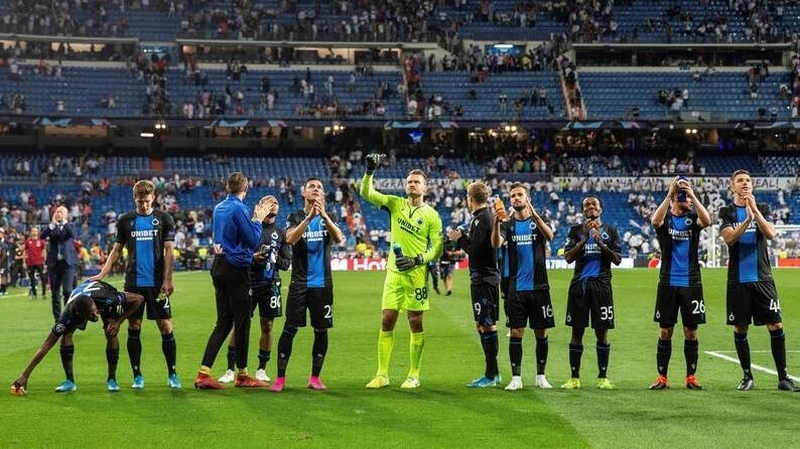 Brugge's players take the plaudits after their draw