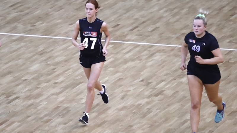 Olivia Divilly (47) and Vicki Wall (49) at the 2019 AFLW Draft Combine in Melbourne
