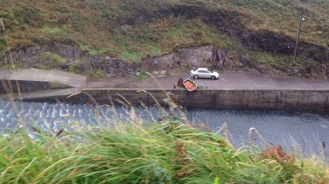 A lucky escape for a traditional currach lifted from her stage during high tide in Cuas an Bhodaigh, Co Kerry. Another foot or two...