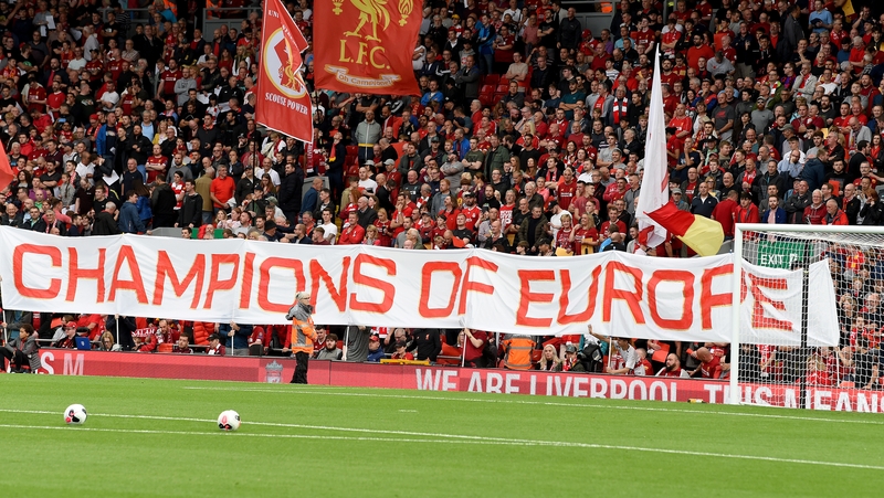 Supporters on the Kop before kick-off at Anfield