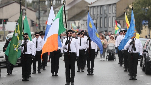 Several hundred participants took part in the march, with some wearing paramilitary style clothing