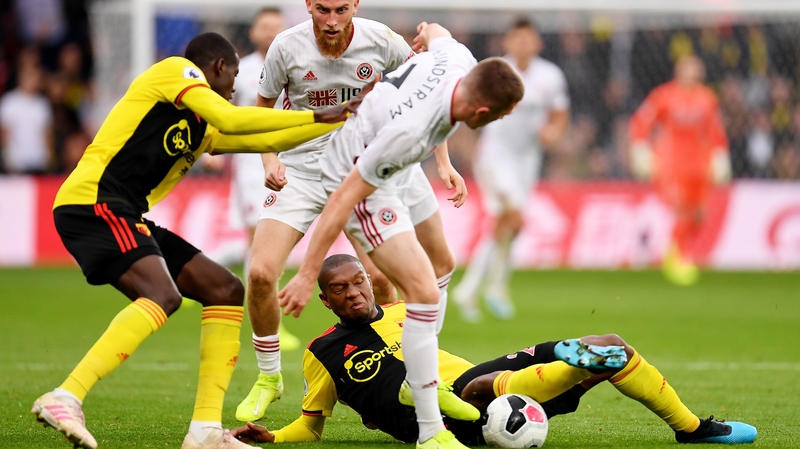 Players battled for the ball at Vicarage Road