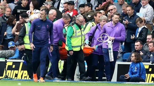 Hugo Lloris is stretchered off