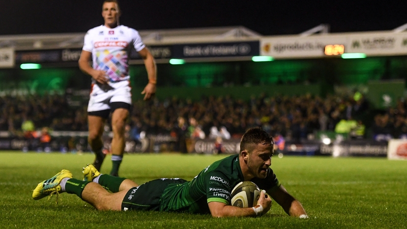 Man of the match Caolin Blade slides over for a try