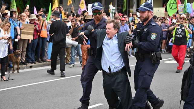 People staged a sit-in on a busy inner-city road in Sydney where some were arrested. Thirty people were later charged
