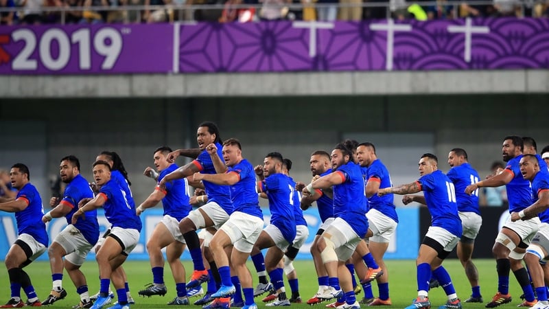 Samoa players perform Siva Tau before kick-off against Scotland