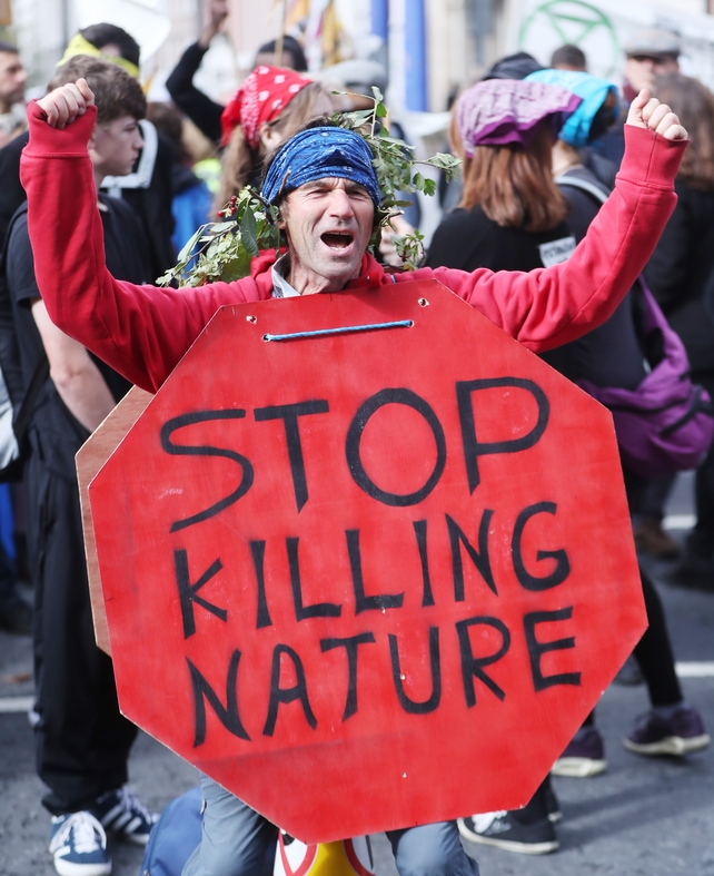 Members of Extinction Rebellion begin a week of direct action to highlight the Government's climate in-action in Dublin city centre