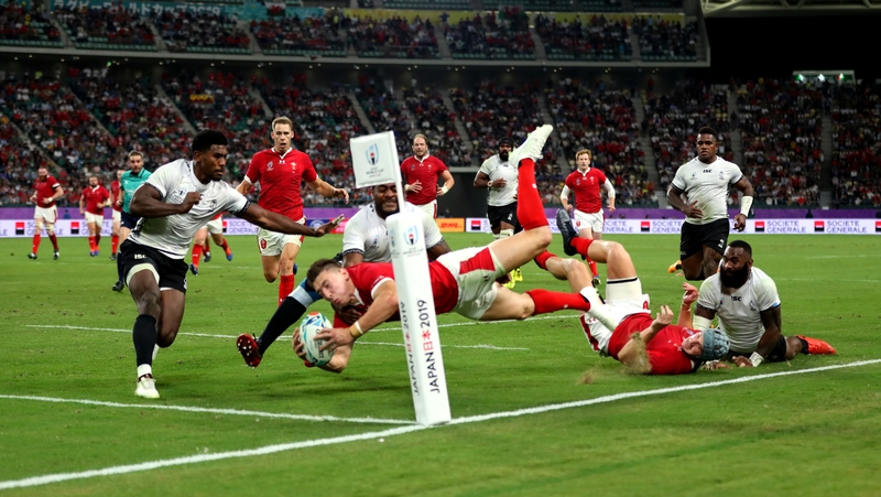 Wales' Josh Adams scores his sides third try