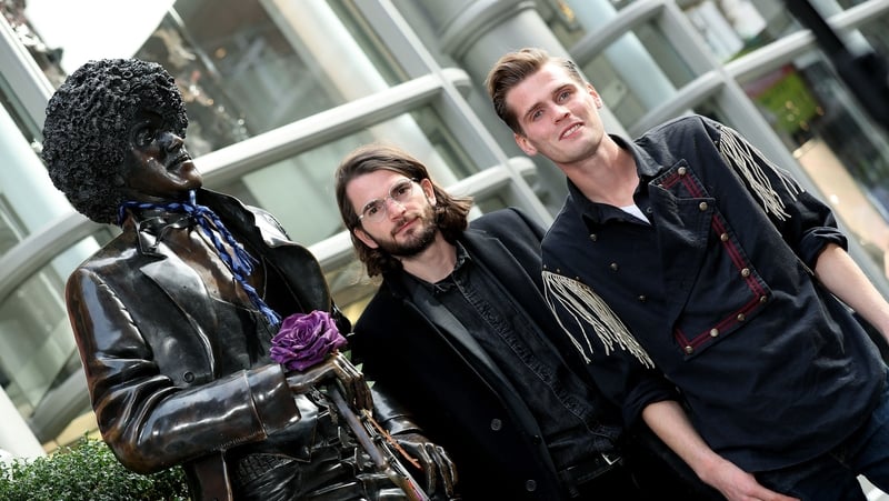 Harry and Alfie with the Phil Lynott statue on Harry Street, Dublin