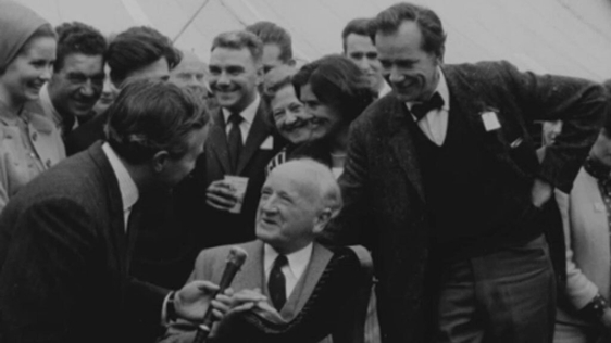 Richard Hayward talks to 'Newsbeat' reporter Al Byrne at the Galway Oyster Festival (1964)
