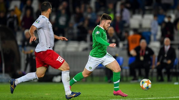 Aaron Connolly advances on goal