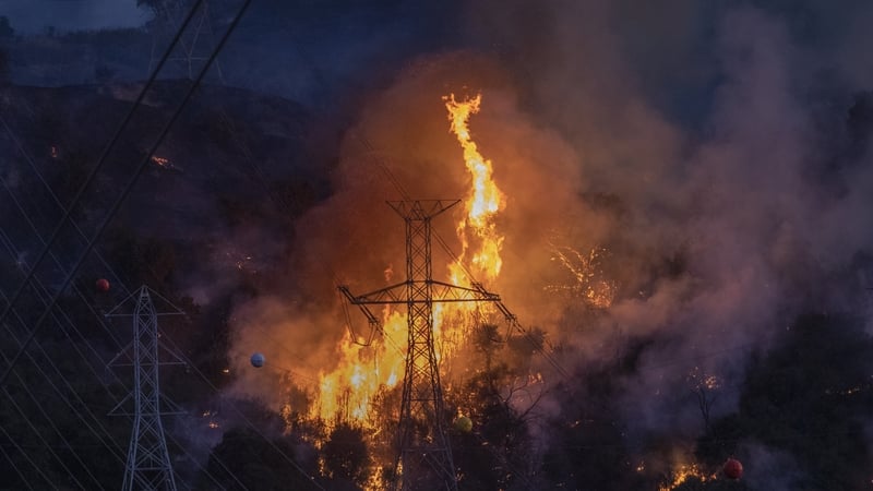 Two firefighters have suffered minor injuries, and 31 structures have been either damaged or destroyed