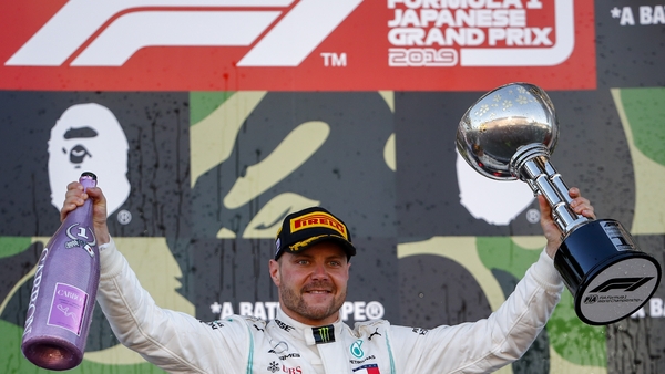 Bottas celebrates on the podium