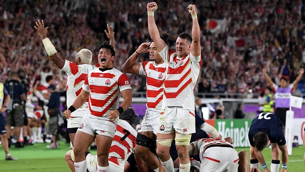 Japan players celebrate at the end