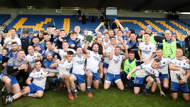 St Patrick's players celebrate with the Miley Cup