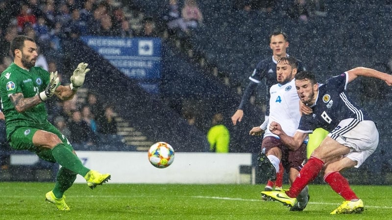 Scotland's John McGinn completes his hat-trick