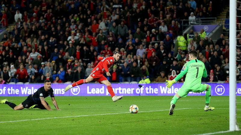 Gareth Bale beats Dominik Livakovic in the Croatia goal just before the interval