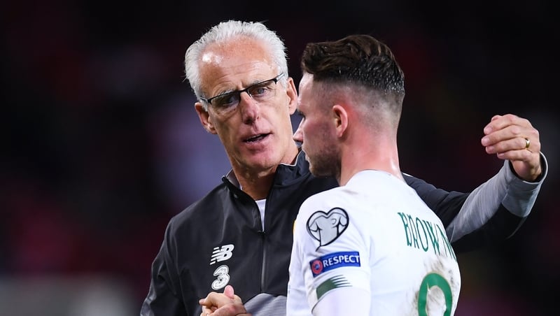Republic of Ireland manager Mick McCarthy consoles Alan Browne at the final whistle