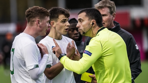 Kameron Ledwidge (L) and Jayson Molumby remonstrate with referee Dumitri Muntean in Iceland