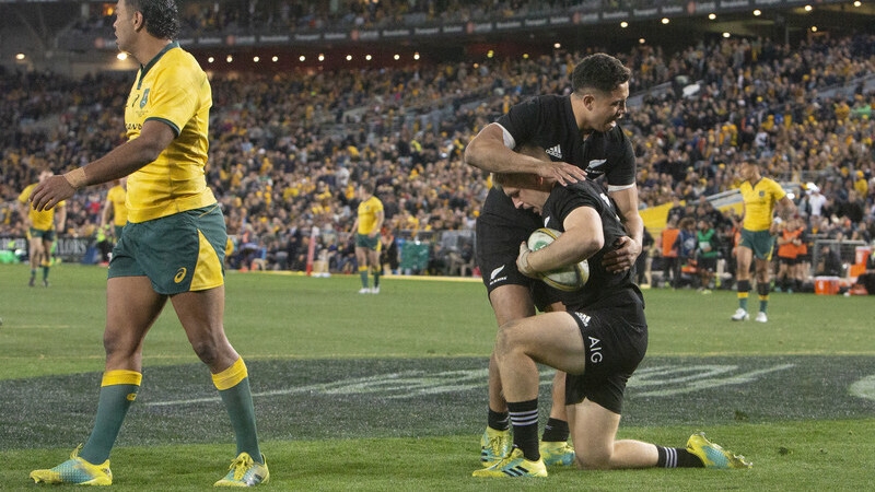 Anton Lienert-Brown (C) celebrating with Jack Goodhue after he scored a try against Australia last year