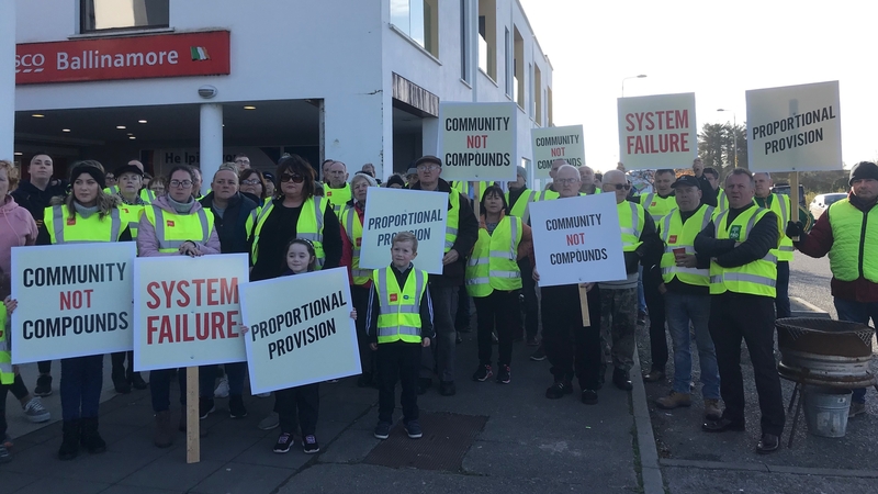 Protest began outside an apartment complex in the town last Monday