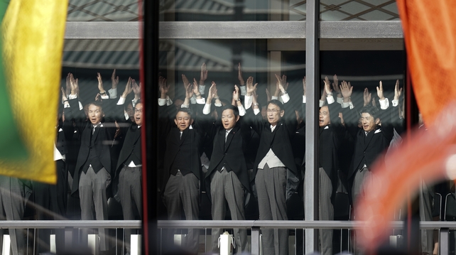 Banzai! Banzai! Banzai! Officials shout 'Long Live the Emperor' after the ceremony