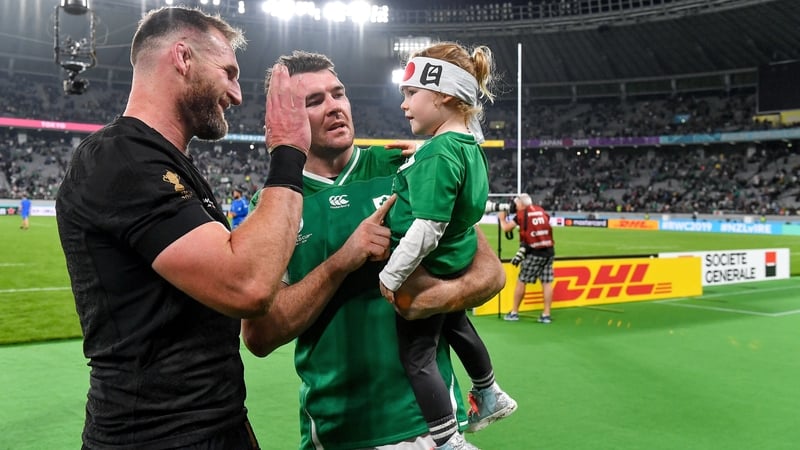Kieran Read enjoys a chat with Peter O'Mahony and his daughter Indie following the quarter-final win last weekend