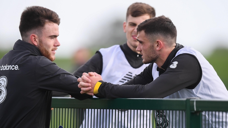 Aaron Connolly, left, with Troy Parrott
