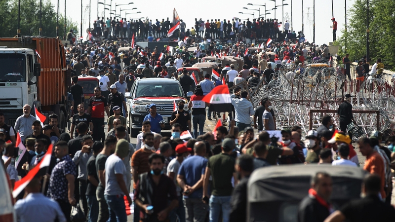 Protesters gather on the Al-Jumhuriyah Bridge during an anti-government protest
