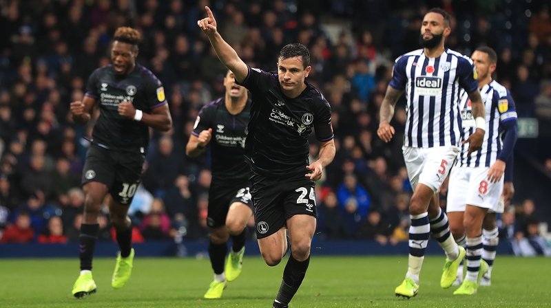 Josh Cullen celebrates scoring the equaliser