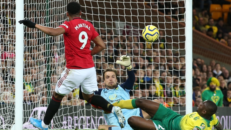 Anthony Martial scores the third for United