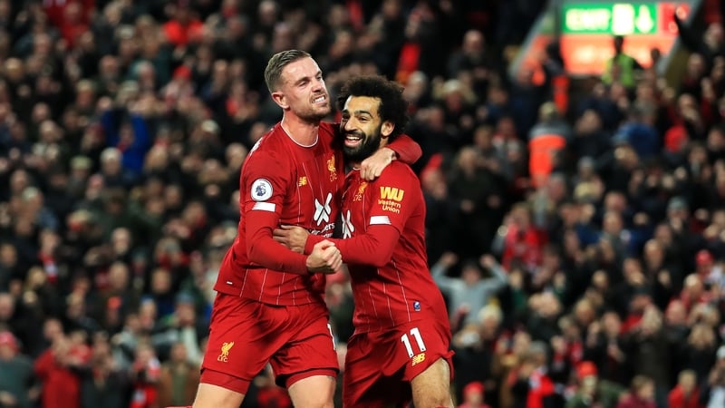 Liverpool goalscorers Jordan Henderson and Mohamed Salah celebrate at Anfield