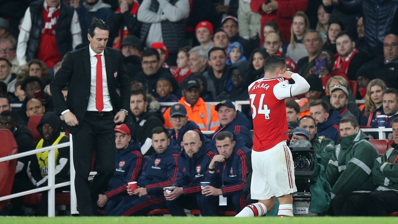 Unai Emery watches as Granit Xhaka takes off his shirt and walks straight down the tunnel after being substituted