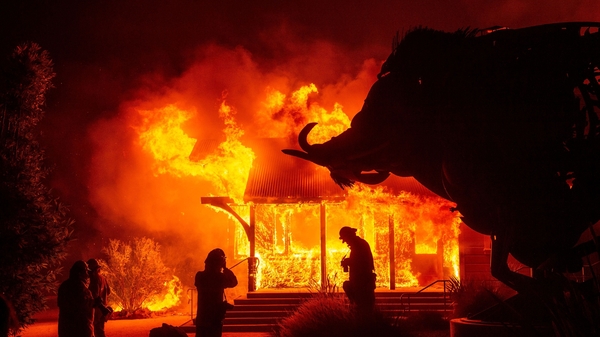 The iconic Soda Rock Winery, built in 1869, burns as flames race through California