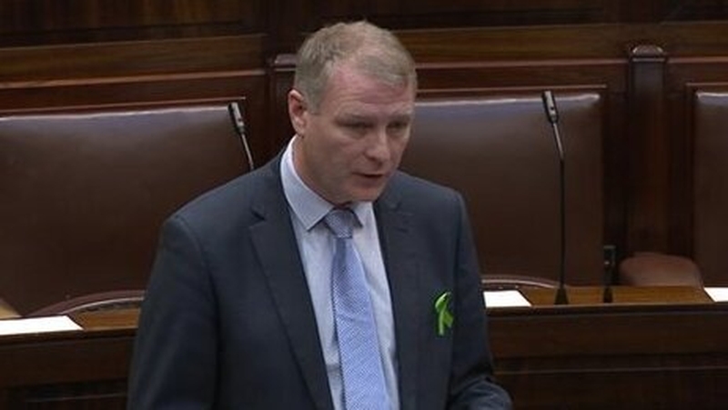 The car at Martin Kenny's home was burned out