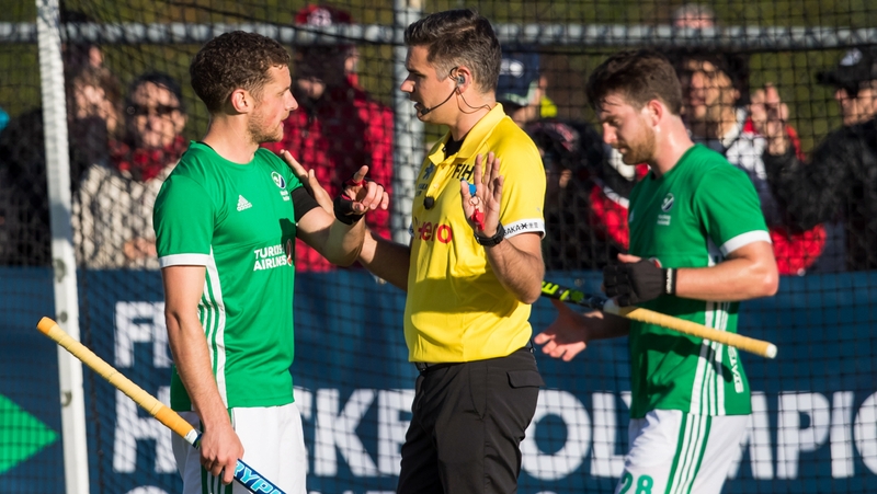 Ireland's Jonathan Bell discusses the video review with on-field referee