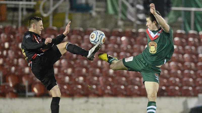 Cork City's Gearoid Morrissey and Matthew Snoddy of Crusaders battle for possession during a Setanta Cup clash in 2013