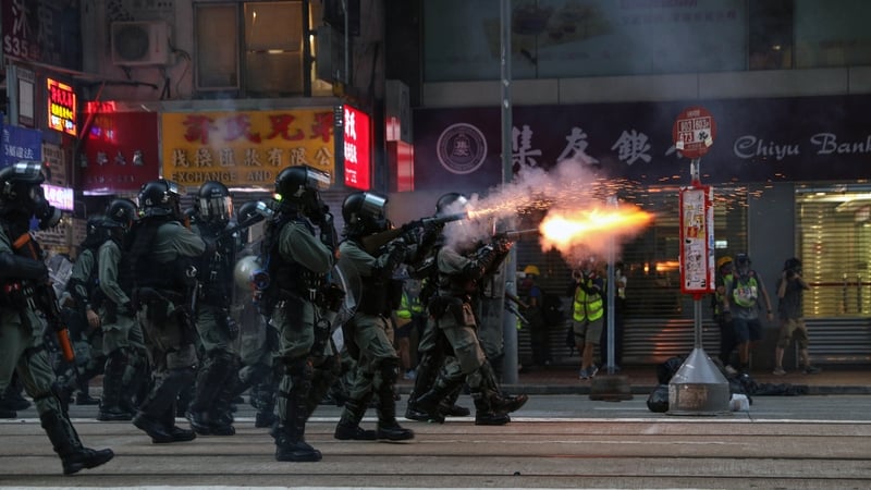 Sustained volleys of tear gas were fired during hours of running battles on the main island while a water cannon truck chased groups of activists as they blocked roads