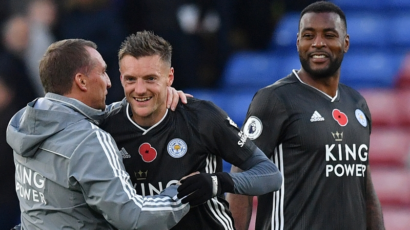 Brendan Rodgers (L) congratulates Jamie Vardy after Leicester's win