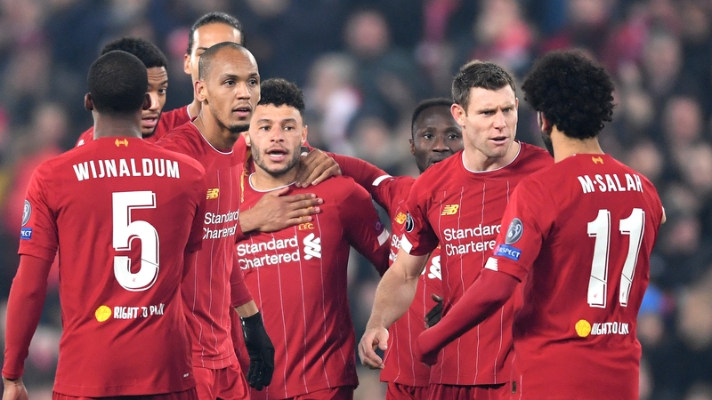 Alex Oxlade-Chamberlain is mobbed after his winner