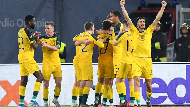 James Forrest is mobbed after his opener