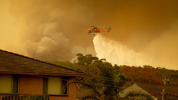 The fires are being fanned by strong winds, low humidity and high temperatures