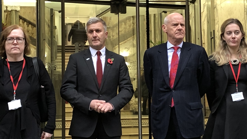 Dr Richard Freeman (2l) with his defence team