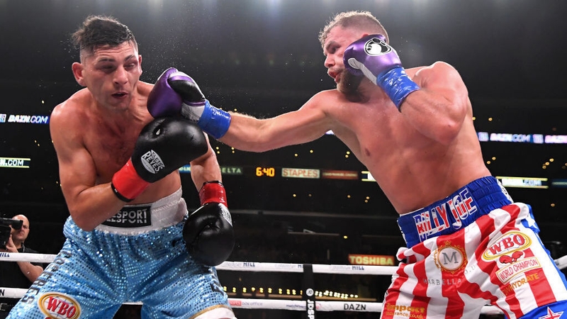 Billy Joe Saunders, right, lands a punch on Marceleo Coceres