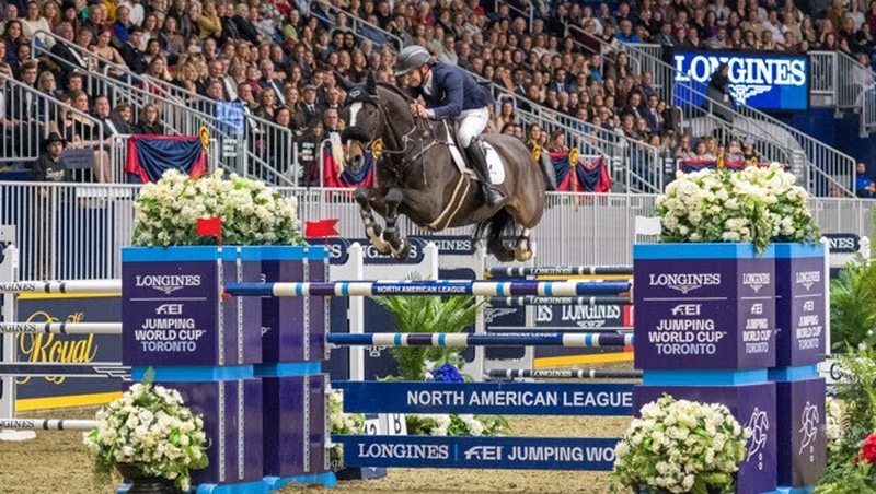 Bertram Allen and GK Casper soar over the final fence (Photo: FEI/Simon Stafford)