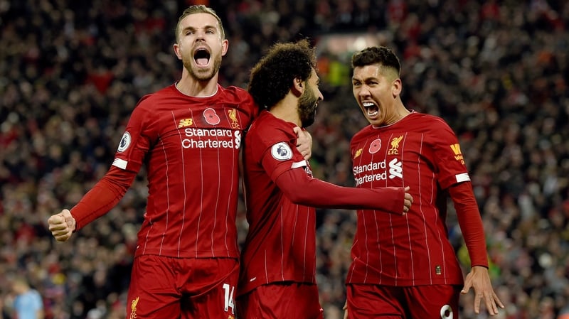 Liverpool celebrate their second goal at they beat Man City in Anfield
